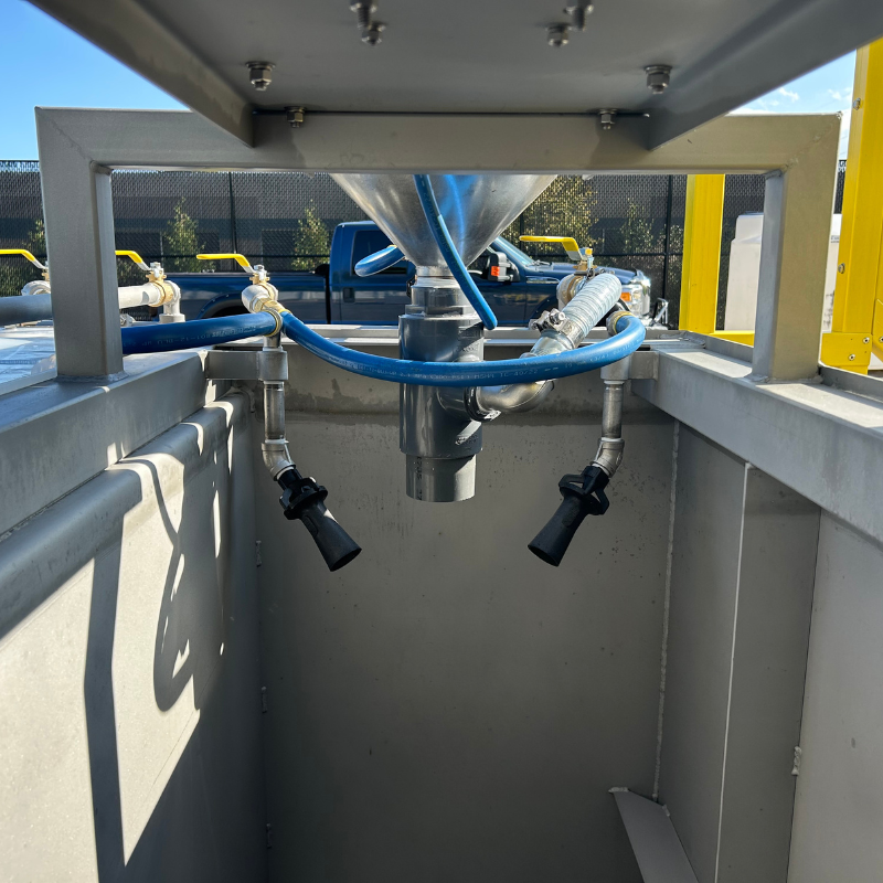 Blue hose, eductor jets, and vogelflow eductor that provide initial high shear mixing on Clearwater Industries' standard dry polymer make-down systems. 